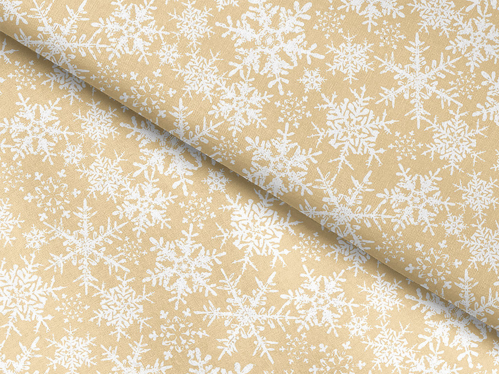 Pamutszövet - karácsonyi mintás, hópihék aranyszínű alapon