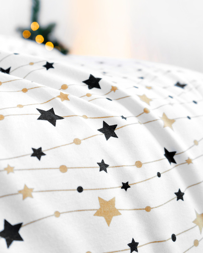 Karácsonyi flanel ágyneműhuzat - arany és fekete csillagok fehér alapon