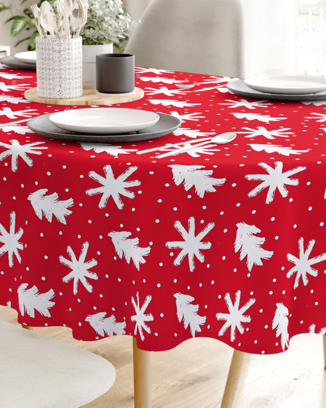 Karácsonyi pamut asztalterítő - hópihék és karácsonyfák piros alapon - ovális