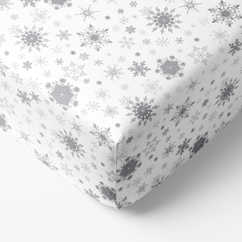 Exkluzív karácsonyi körgumis pamut lepedő - ezüst hópihék fehér alapon